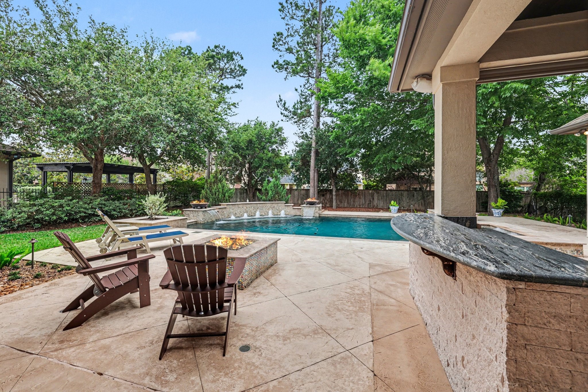 3 Player Ridge Court The Woodlands, TX 77382 - Photo 35 of 50 Step outside to the private backyard oasis!