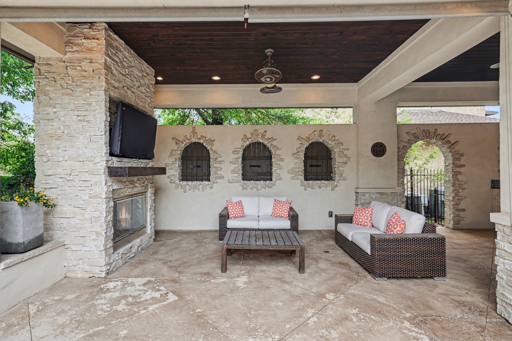 3 Player Ridge Court The Woodlands, TX 77382 - Photo 37 of 50 Closer look at the outdoor patio area with a cozy fireplace.