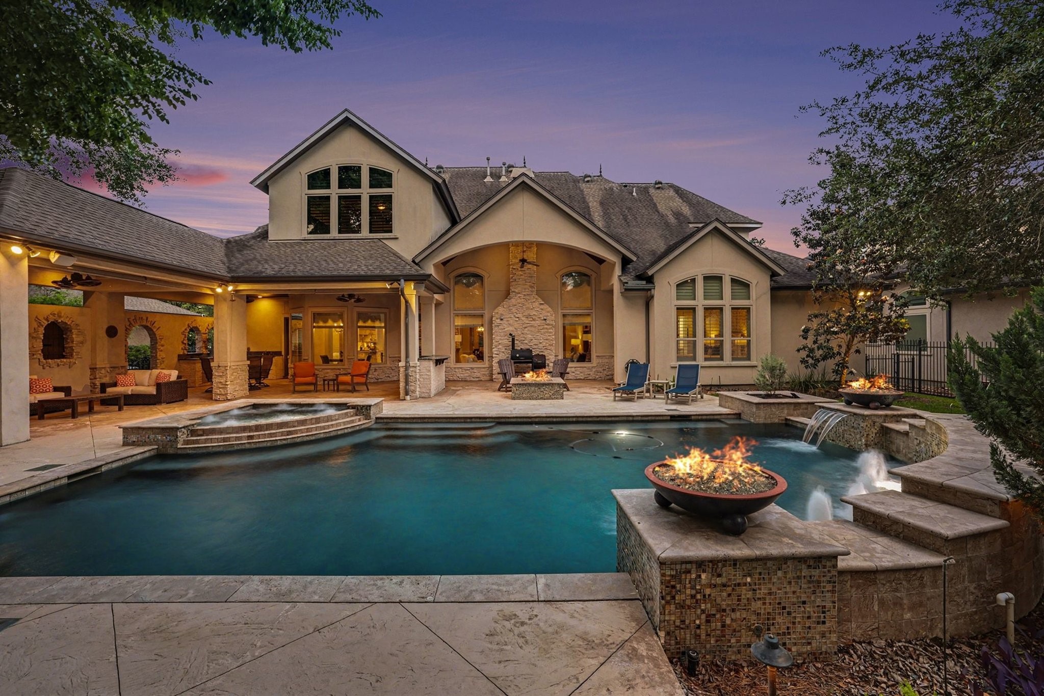 3 Player Ridge Court The Woodlands, TX 77382 - Photo 43 of 50 Luxurious outdoor living at its finest with a pool featuring both a heater and chiller, perfect for year-round enjoyment.