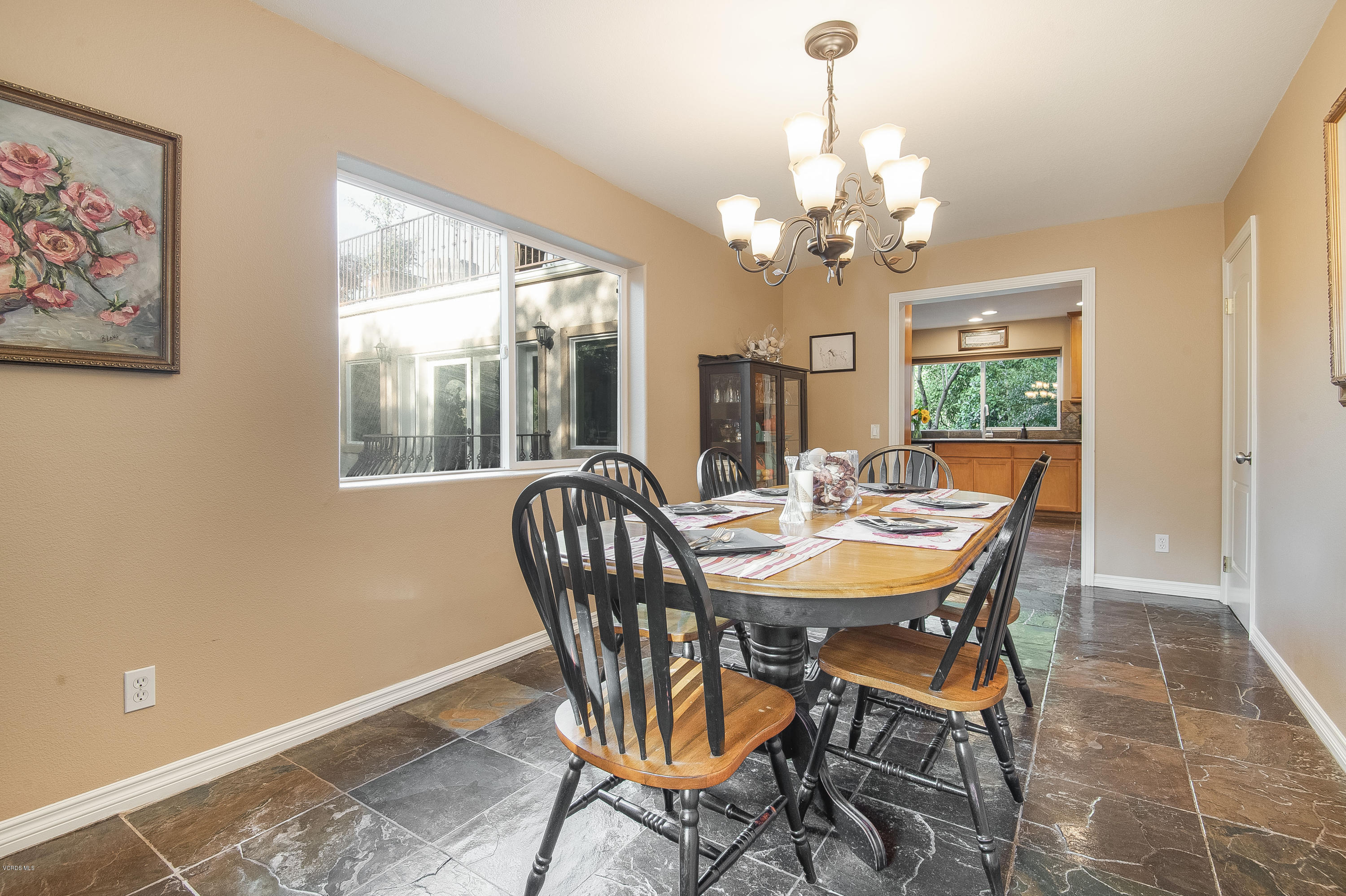 1079 Katherine Road Simi Valley, CA 93063 - Photo 15 of 53 a view of a dining room with furniture a chandelier and a window