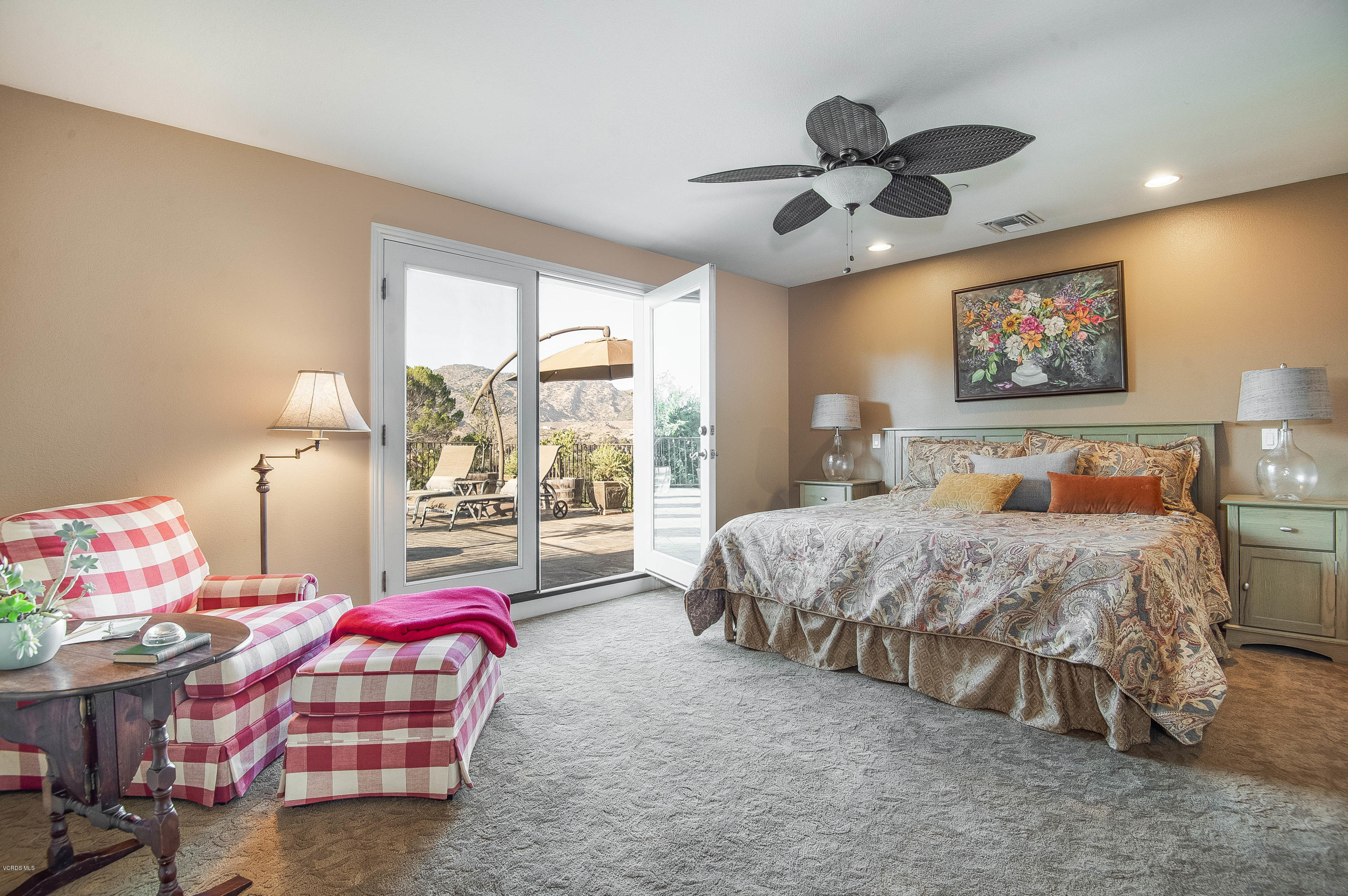 1079 Katherine Road Simi Valley, CA 93063 - Photo 26 of 53 a spacious bedroom with a bed and a chandelier