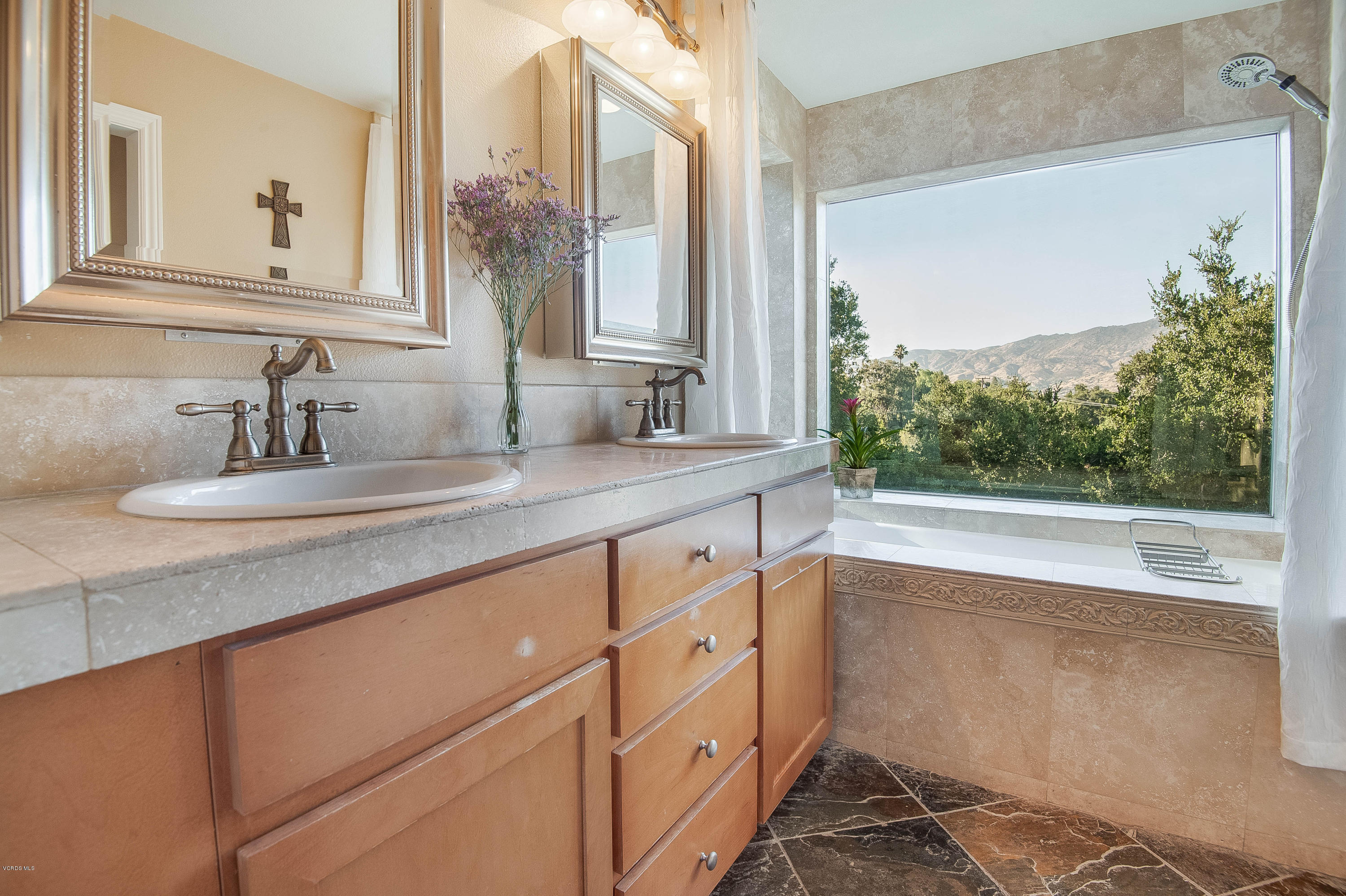 1079 Katherine Road Simi Valley, CA 93063 - Photo 28 of 53 a bathroom with a sink and a large mirror