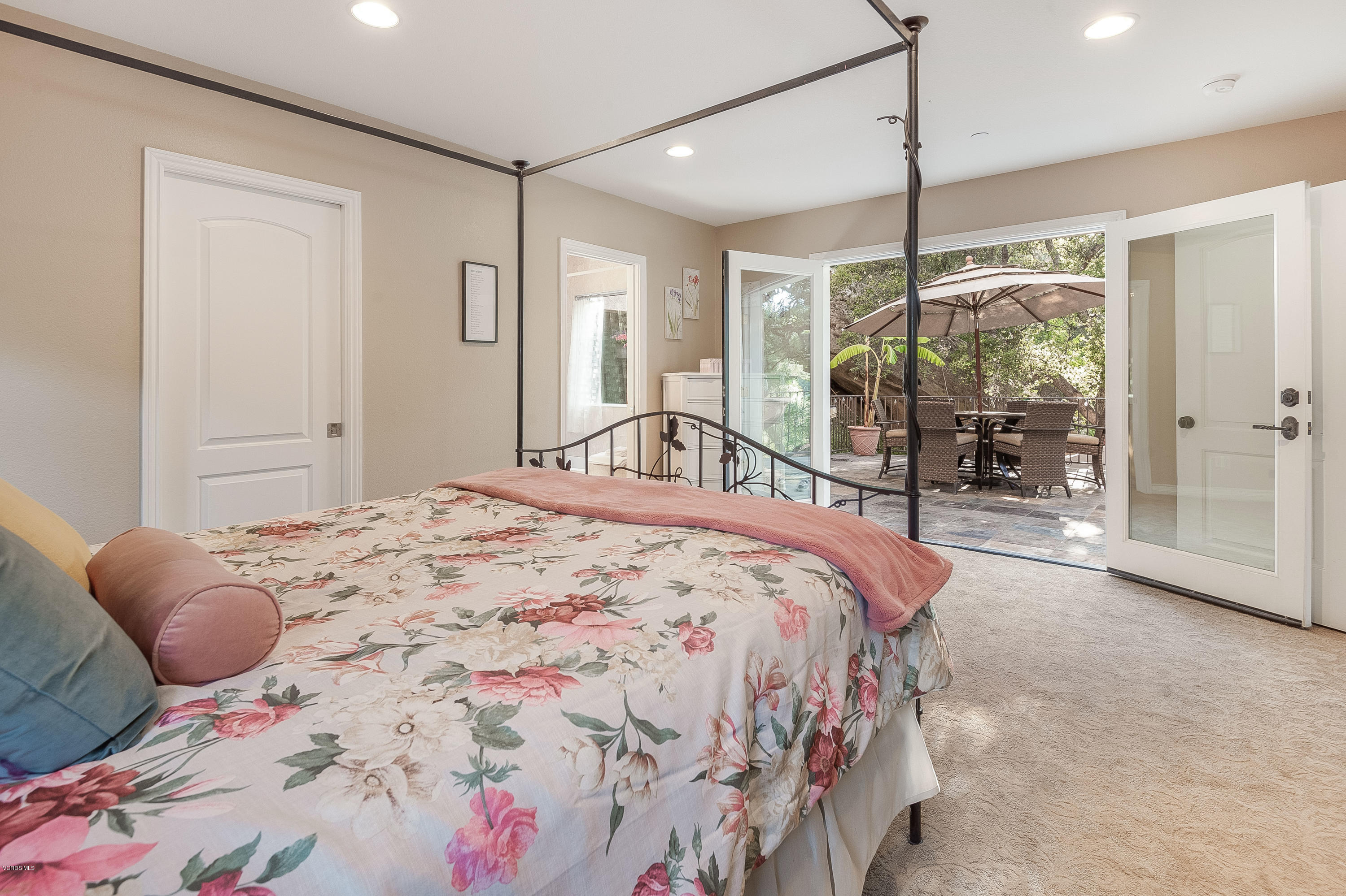 1079 Katherine Road Simi Valley, CA 93063 - Photo 33 of 53 a bedroom with a bed mirror and window