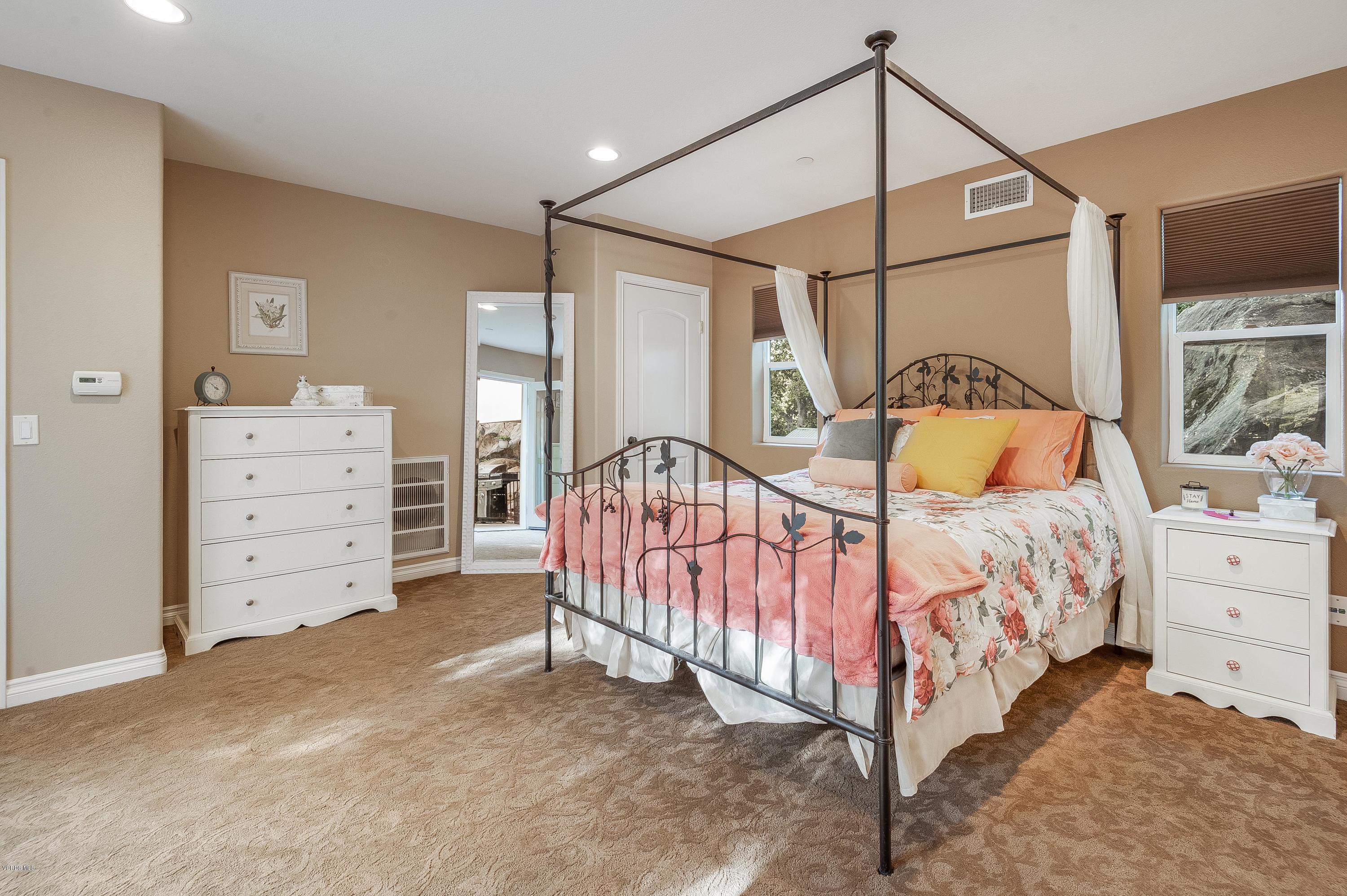 1079 Katherine Road Simi Valley, CA 93063 - Photo 34 of 53 a bedroom with a bed and a window