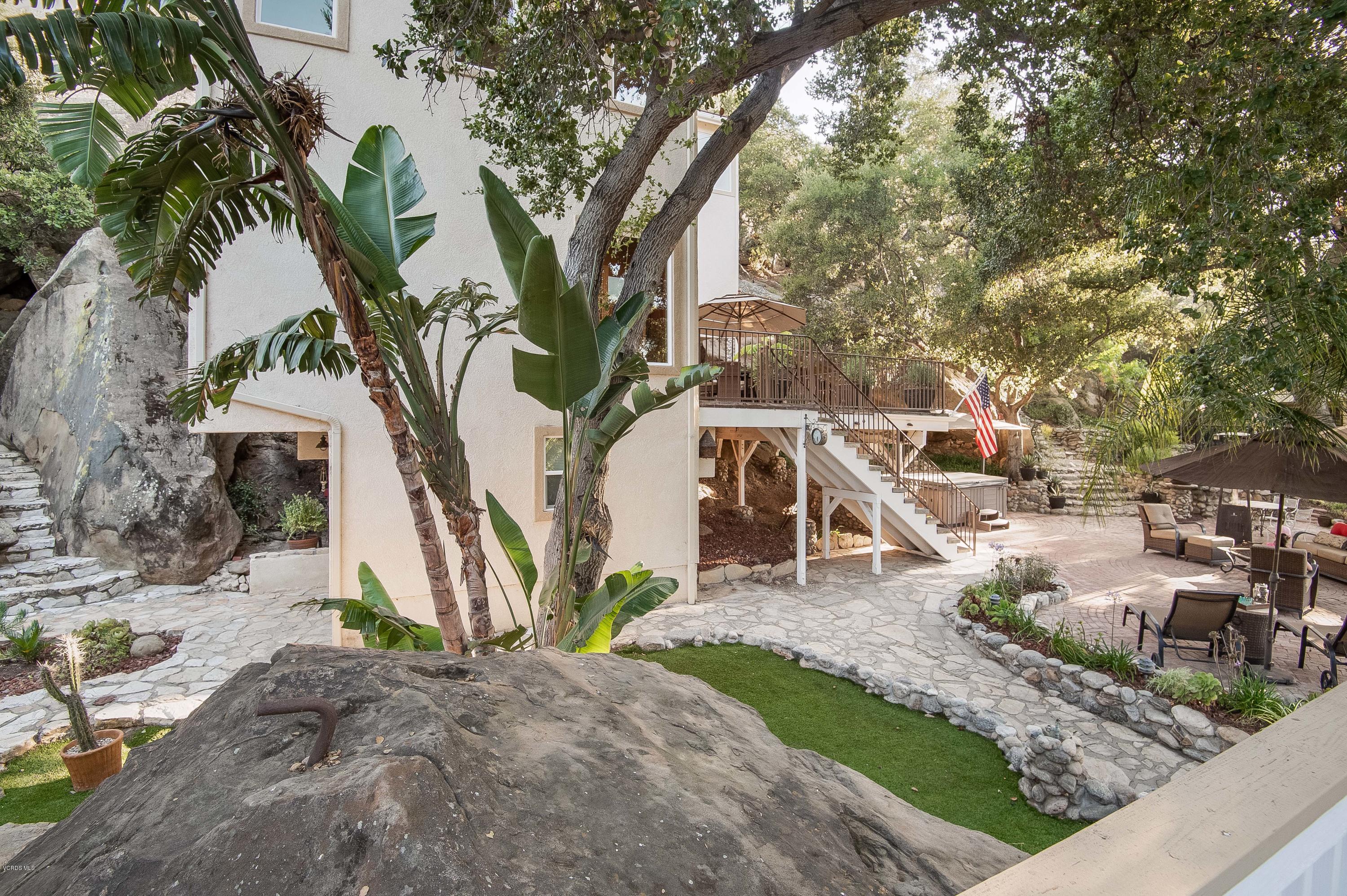 1079 Katherine Road Simi Valley, CA 93063 - Photo 5 of 53 a view of a house with a yard and trees