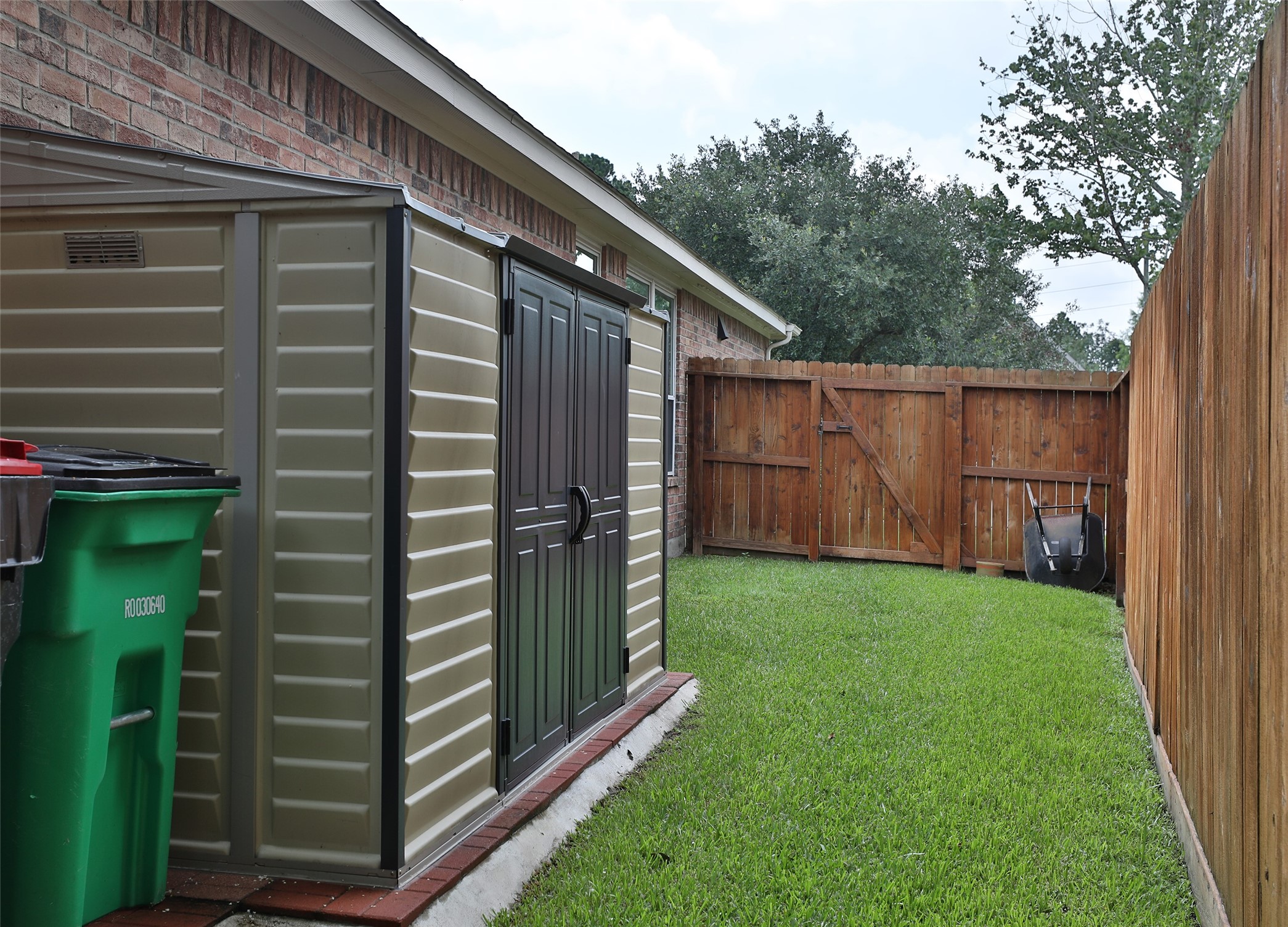20519 Windrose Bend Drive Spring, TX 77379 - Photo 31 of 37 The side yards provide an ideal location for functional enhancements, such as the Kohler generator, pool equipment, and a storage shed.