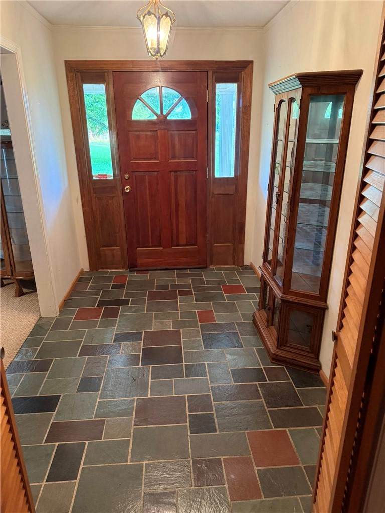4027 Belhaven Road Belton, SC 29627 - Photo 10 of 24 A spacious entry welcomes with durable slate flooring and an elegant front door.