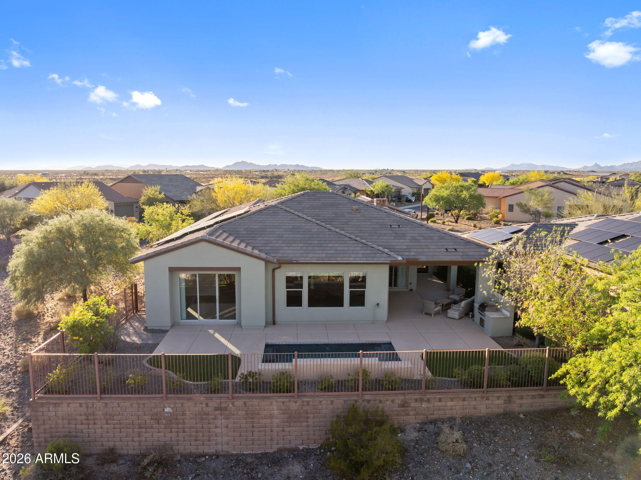 3675 Gold Ridge Road Wickenburg, AZ 85390 - Photo 5 of 58 a view of a house with a yard