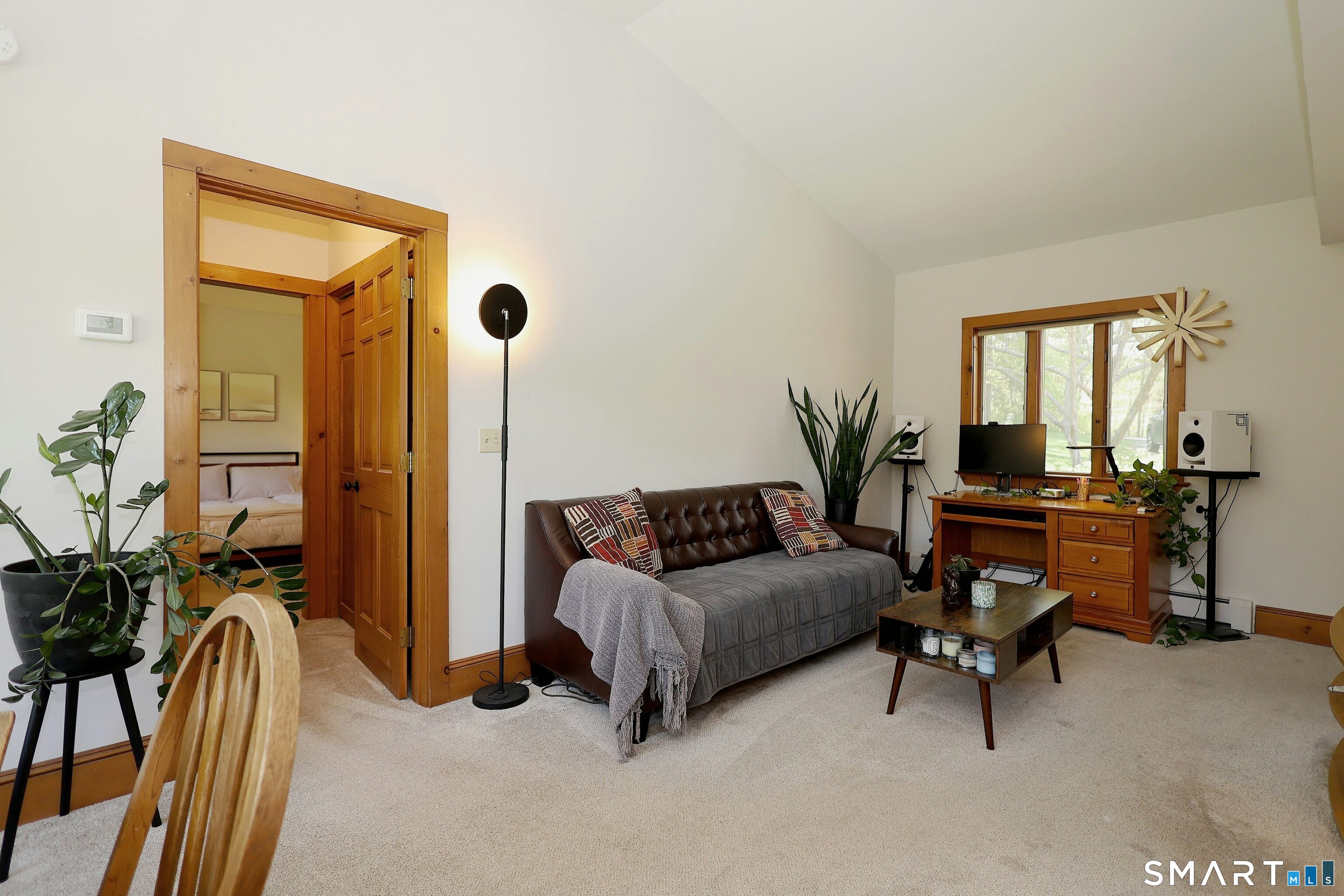 68 Bloomer Road Ridgefield, CT 06877 - Photo 39 of 40 a living room with furniture and a potted plant