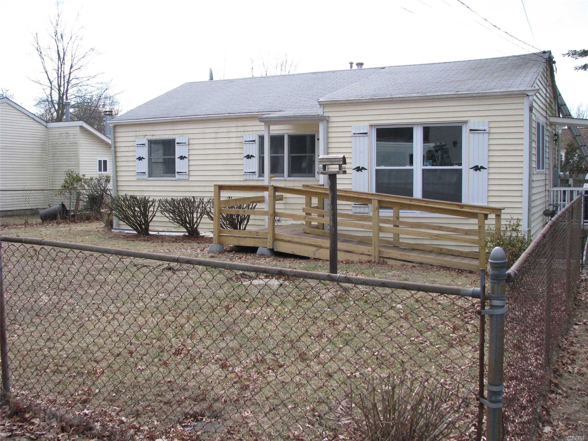 100 Engelke Street Patchogue, NY 11772 - Photo 1 of 1 a front view of a house with garden