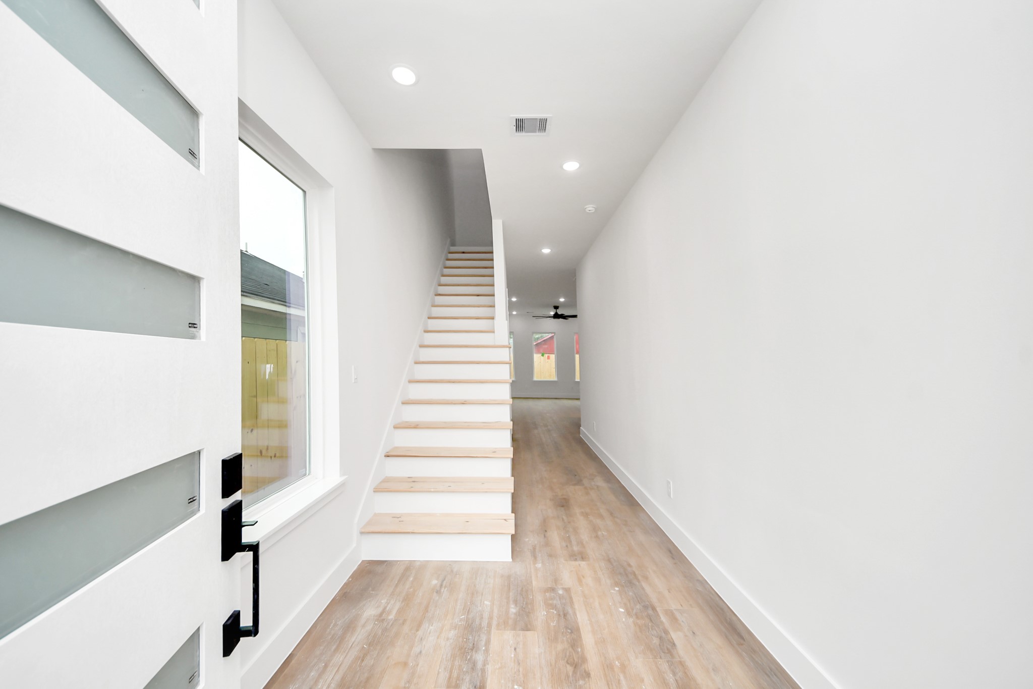 8206 Colonial Lane Houston, TX 77051 - Photo 5 of 31 a view of entryway with wooden floor