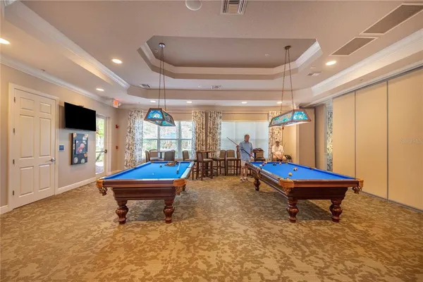 a view of swimming pool with a yard