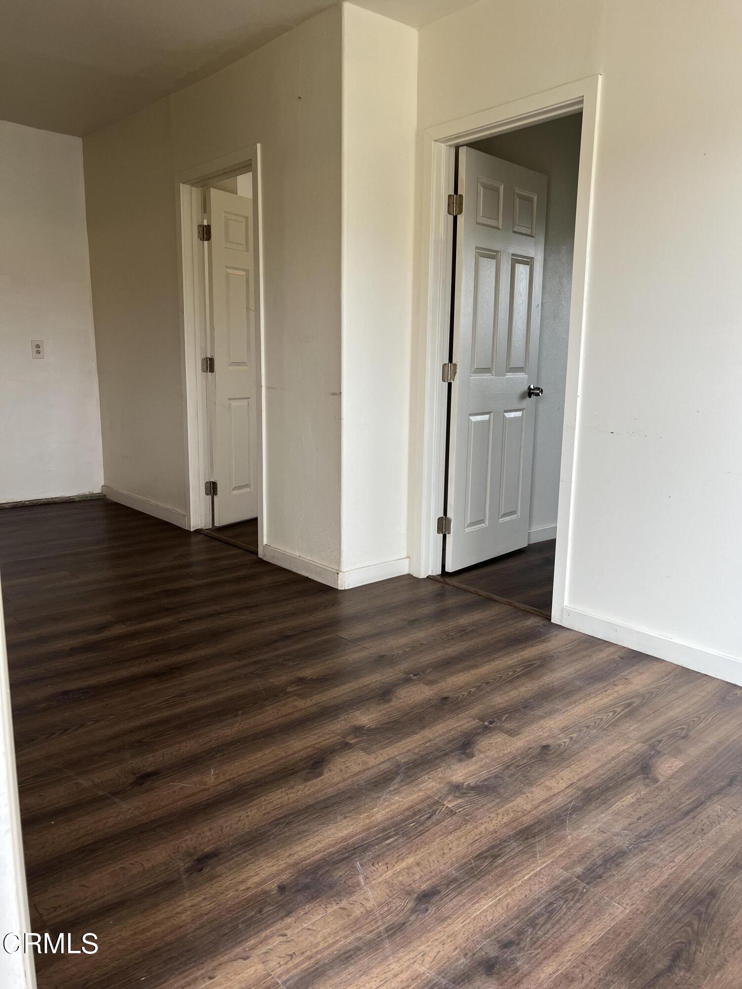4840 Saviers Road Oxnard, CA 93033 - Photo 18 of 24 a view of empty room with wooden floor