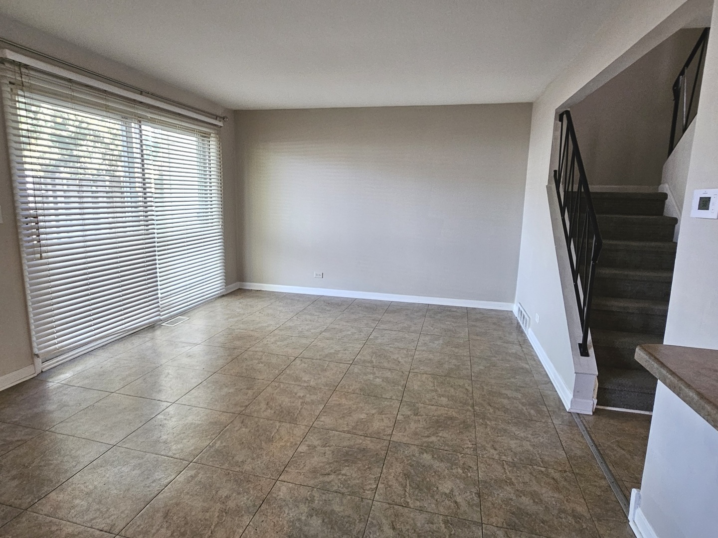 228 Monroe Road Bolingbrook, IL 60440 - Photo 2 of 14 a view of an empty room with a window