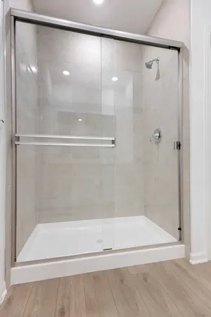 a front view of a house with a outdoor space and balcony