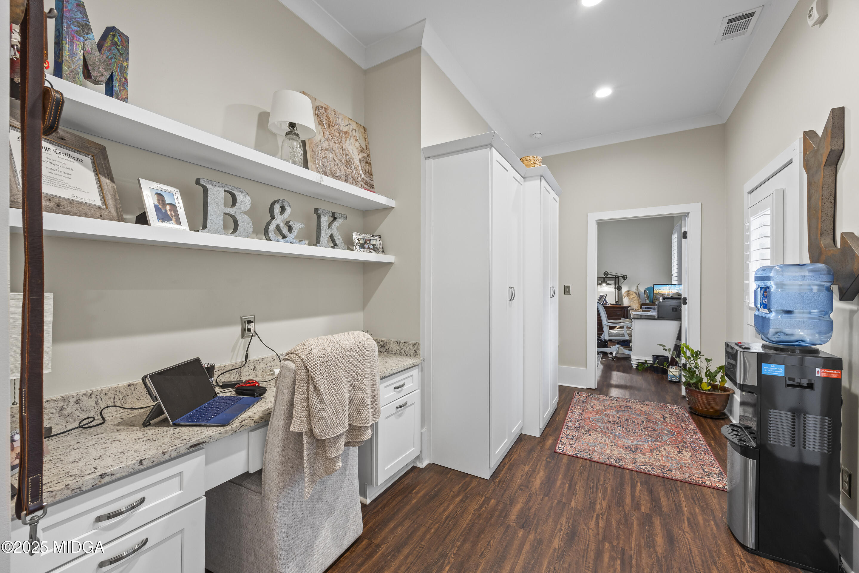 4121 North Swann Street Covington, GA 30014 - Photo 19 of 52 a hallway with a view of living room