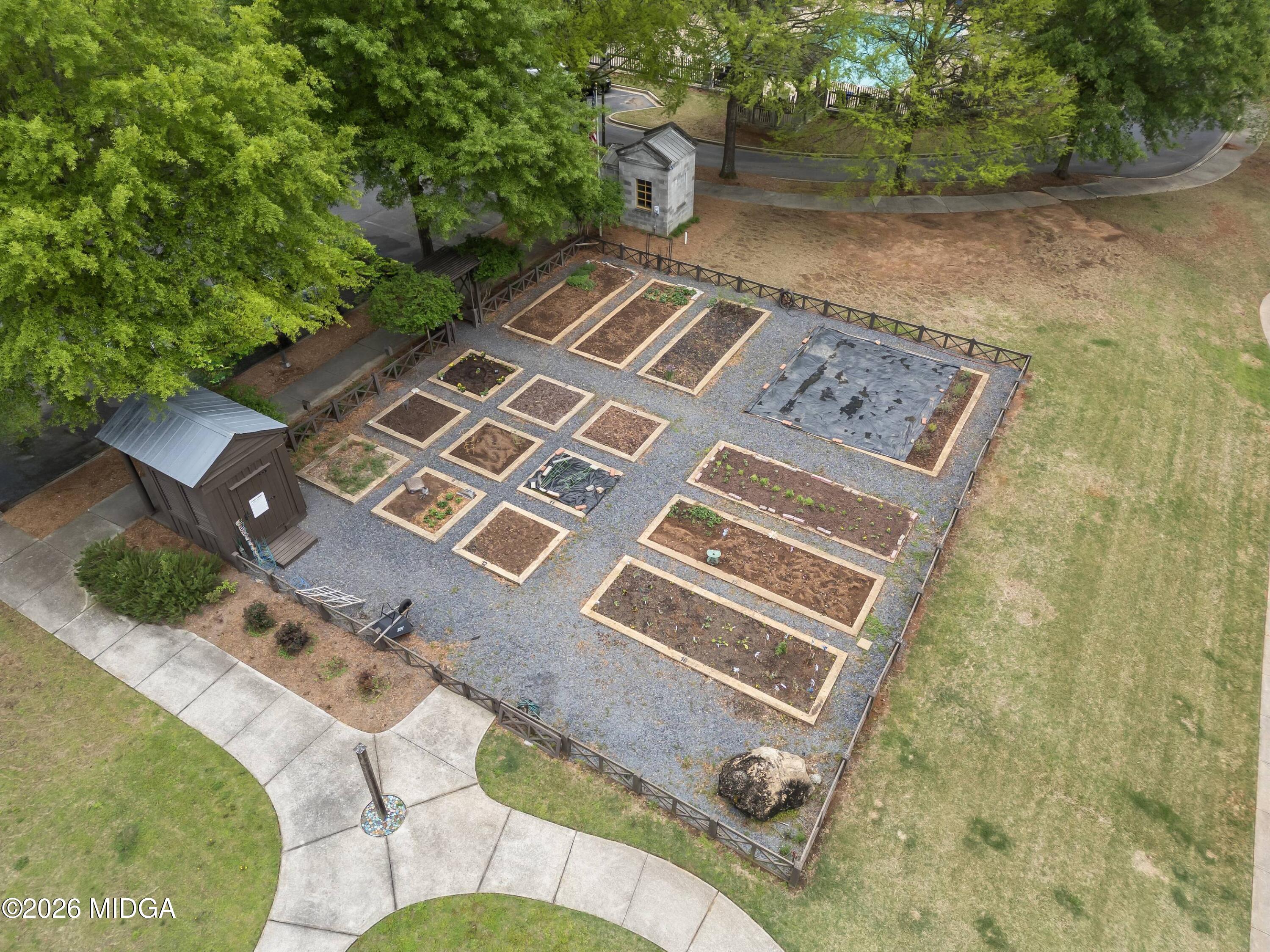 4121 North Swann Street Covington, GA 30014 - Photo 45 of 52 an aerial view of a house with a yard