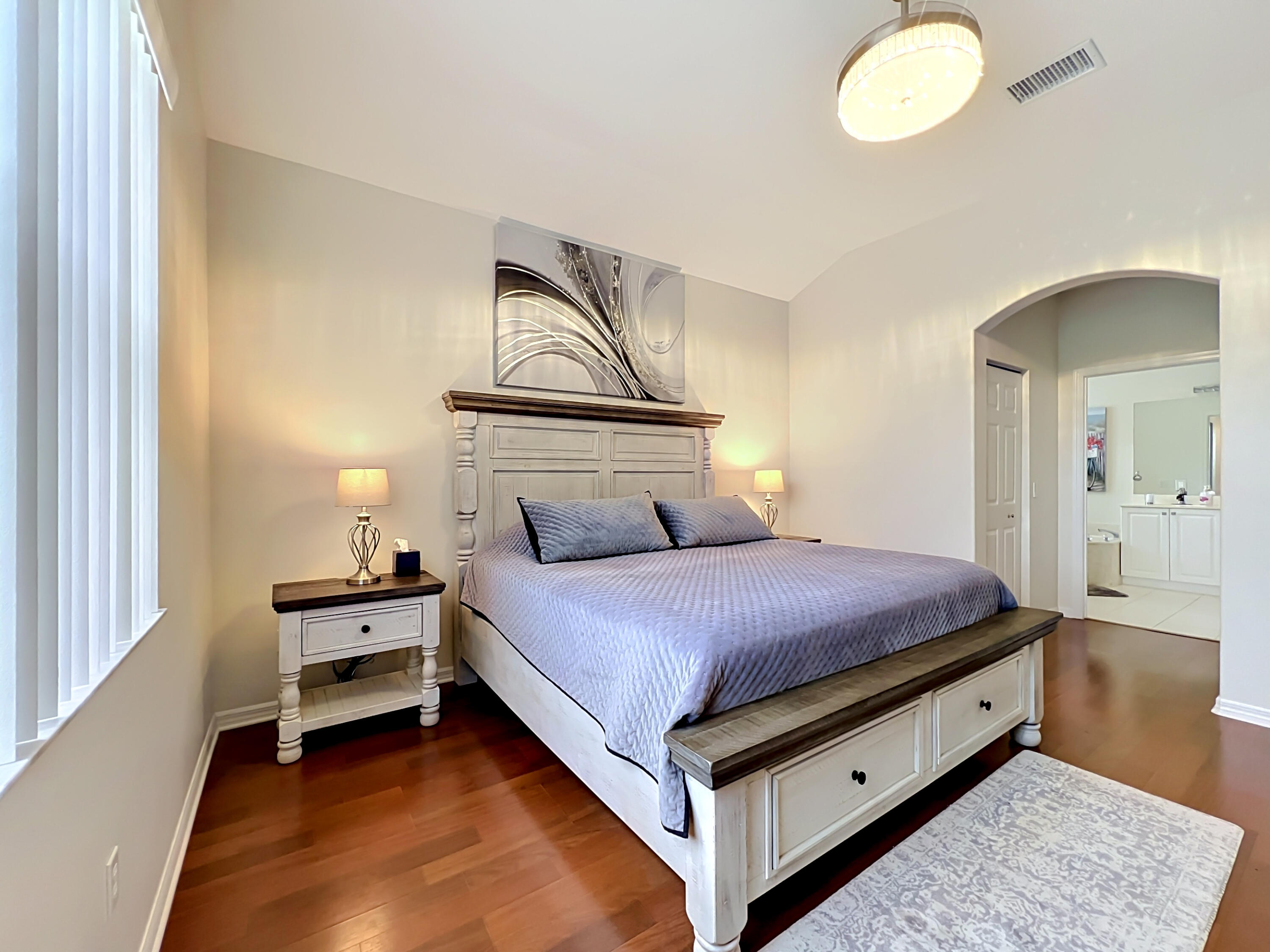 1343 Shoreline Circle Sebastian, FL 32958 - Photo 12 of 36 a bedroom with a bed and window