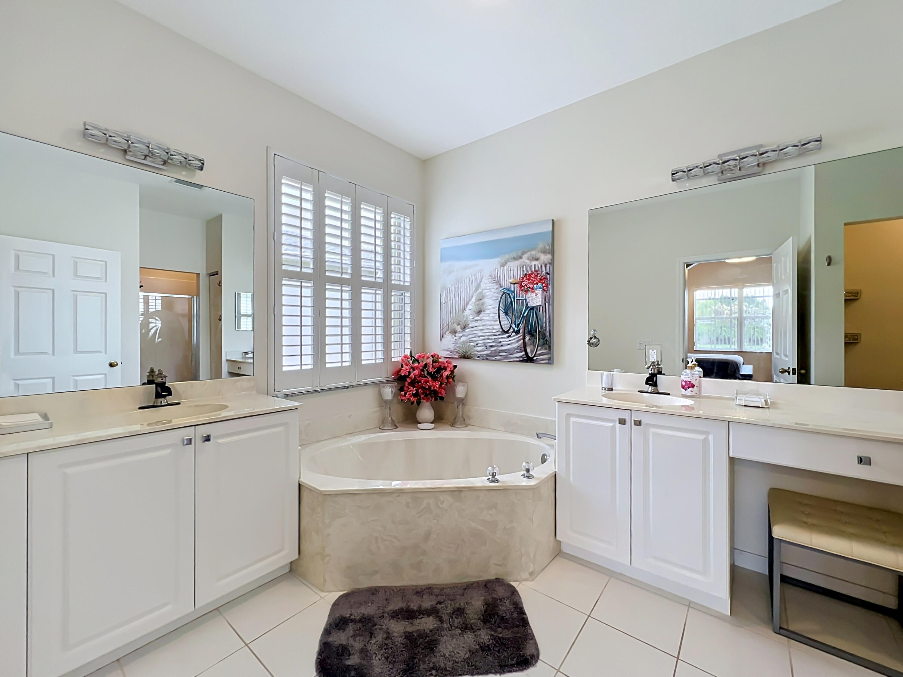 1343 Shoreline Circle Sebastian, FL 32958 - Photo 14 of 36 a bathroom with a sink and a mirror
