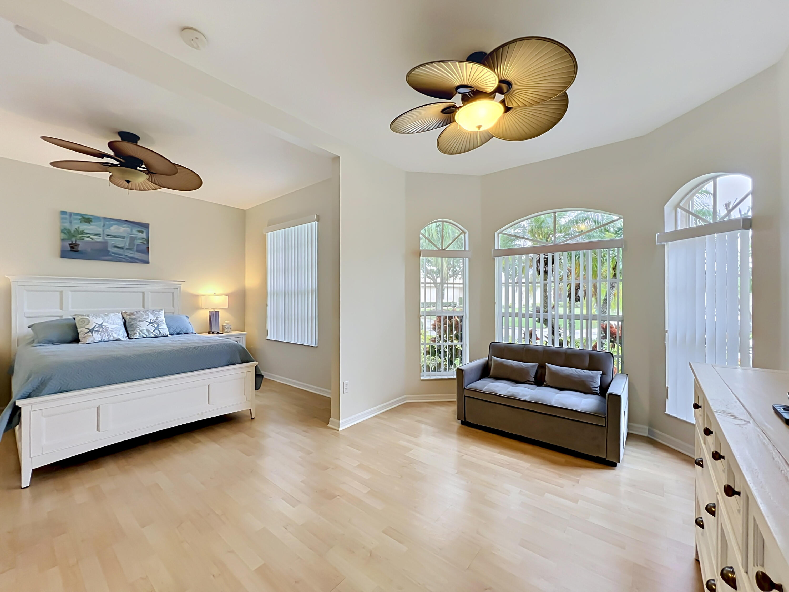 1343 Shoreline Circle Sebastian, FL 32958 - Photo 24 of 36 a living room with furniture chandelier and a large window