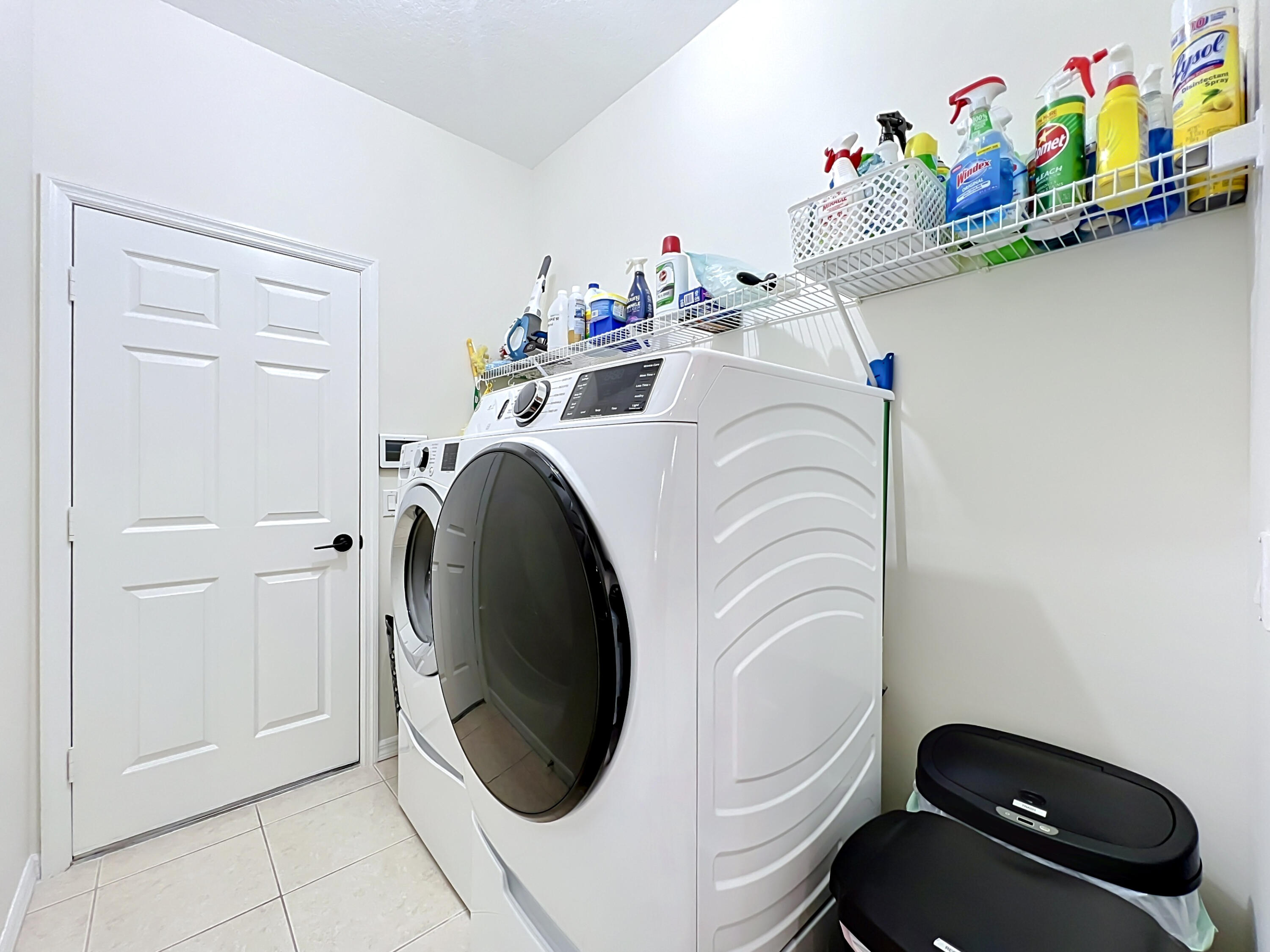 1343 Shoreline Circle Sebastian, FL 32958 - Photo 26 of 36 a utility room with dryer and washer