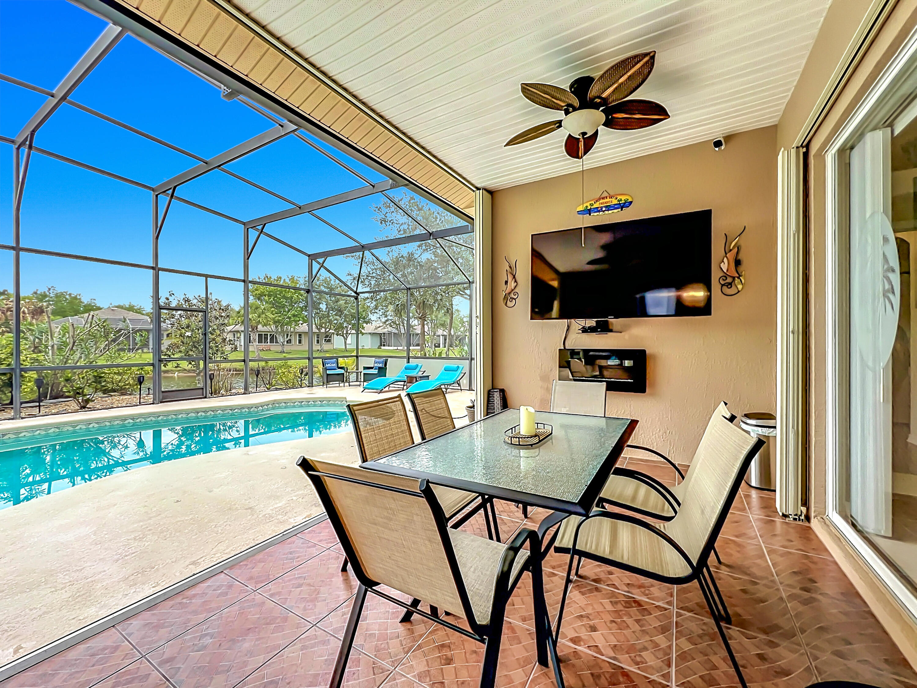 1343 Shoreline Circle Sebastian, FL 32958 - Photo 28 of 36 a view of a patio with a table and chairs