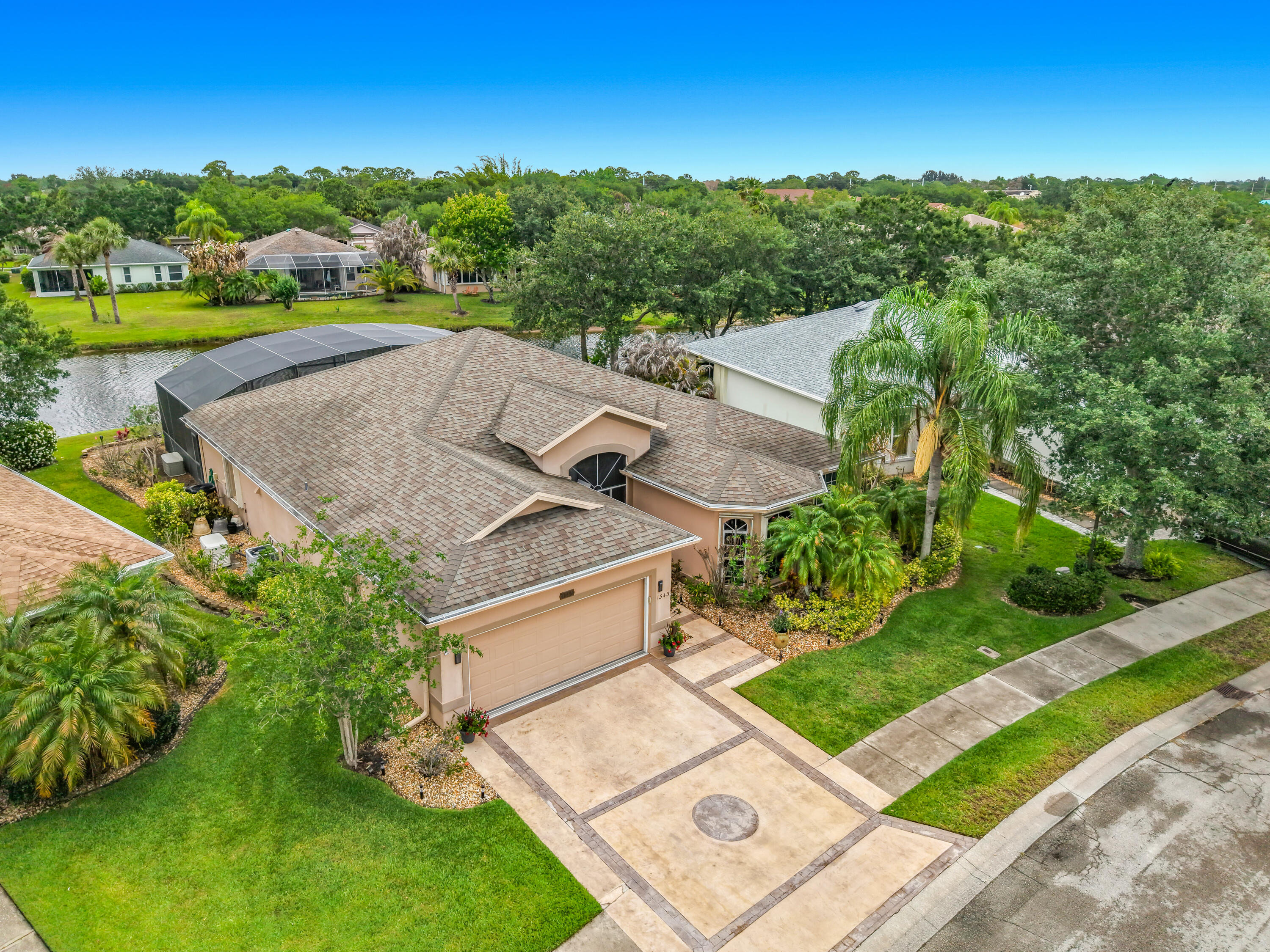 1343 Shoreline Circle Sebastian, FL 32958 - Photo 3 of 36 an aerial view of a house with garden space and street view