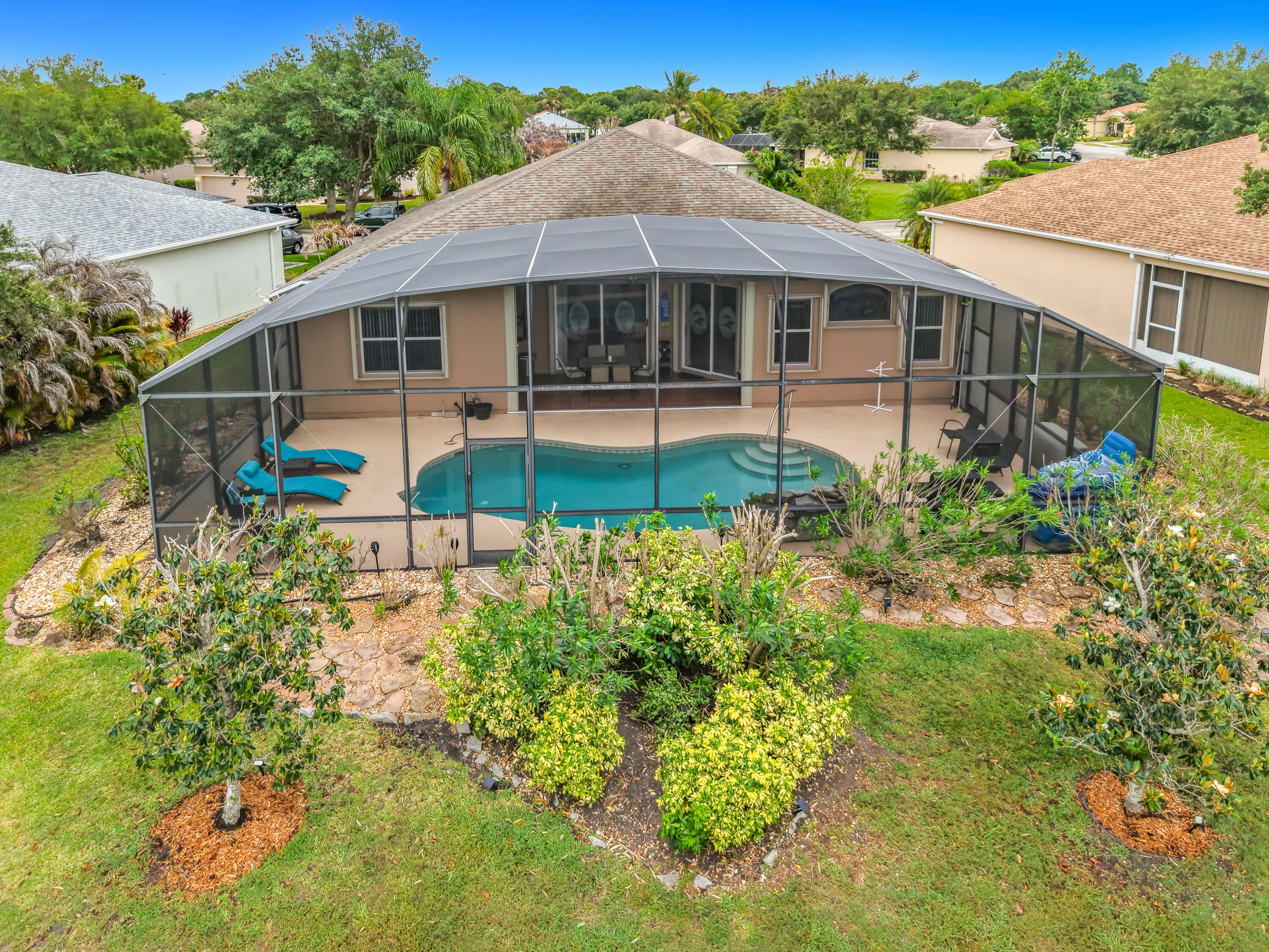 1343 Shoreline Circle Sebastian, FL 32958 - Photo 31 of 36 a front view of a house with a yard