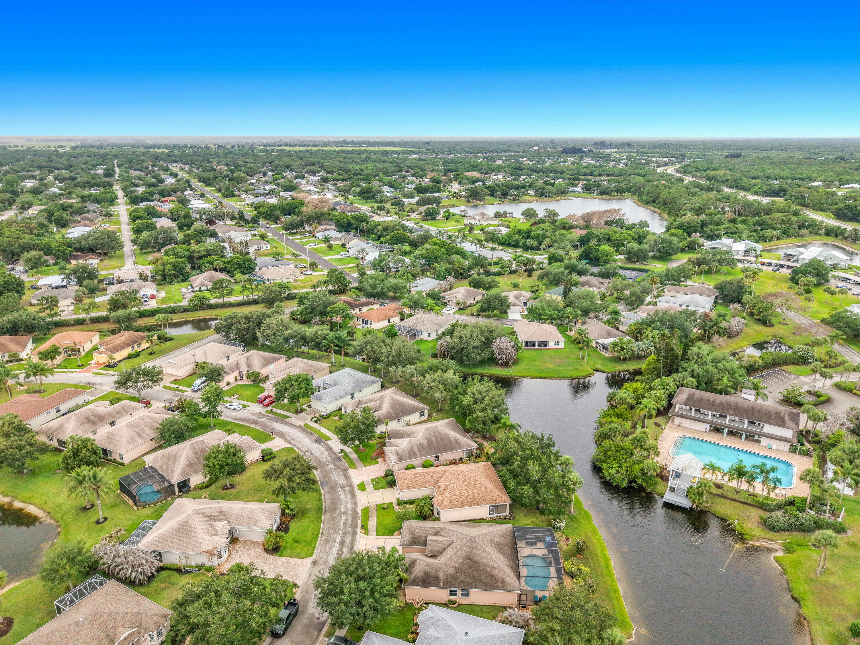 1343 Shoreline Circle Sebastian, FL 32958 - Photo 34 of 36 an aerial view of residential houses with outdoor space