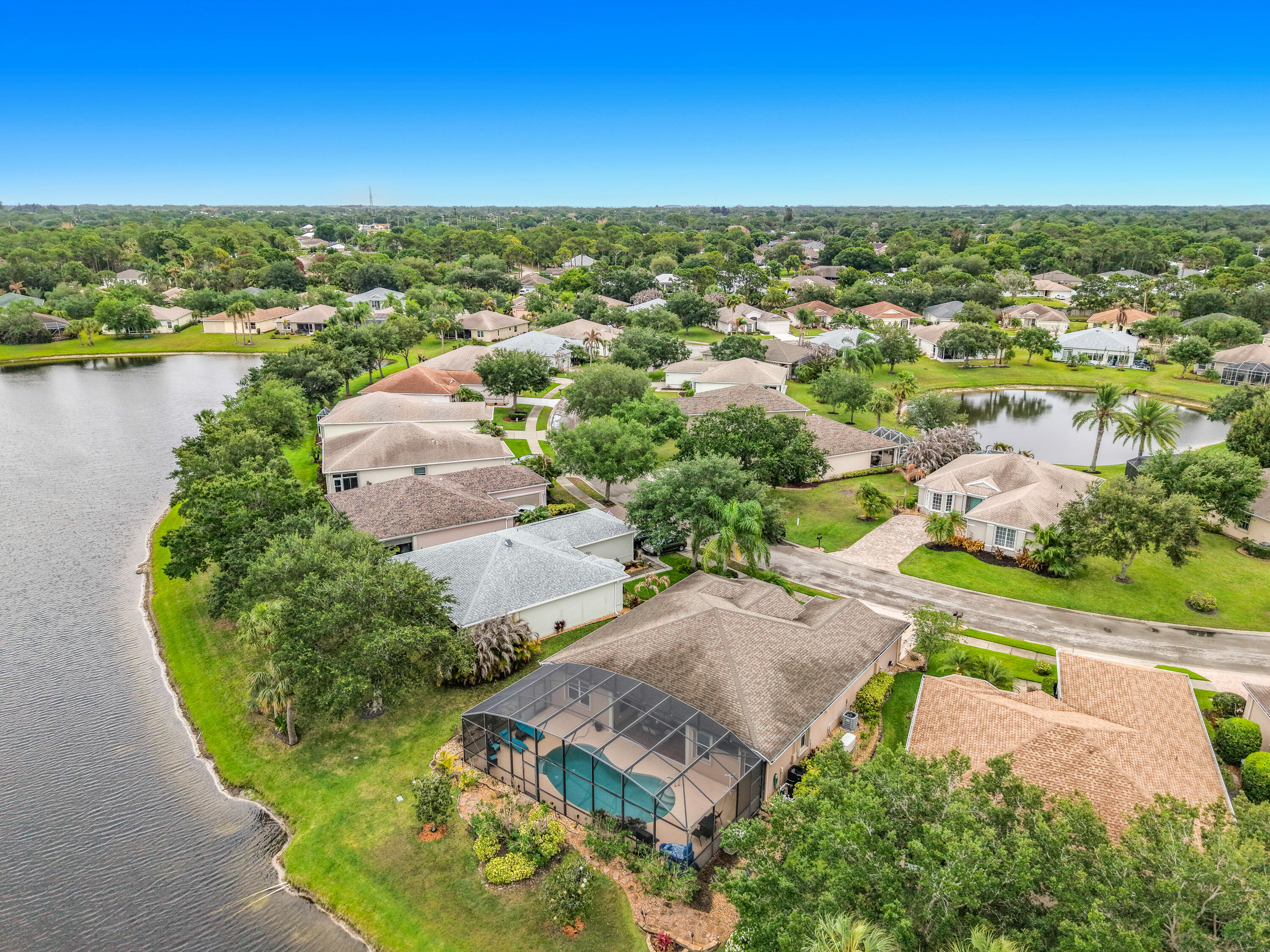 1343 Shoreline Circle Sebastian, FL 32958 - Photo 35 of 36 an aerial view of a house with a garden