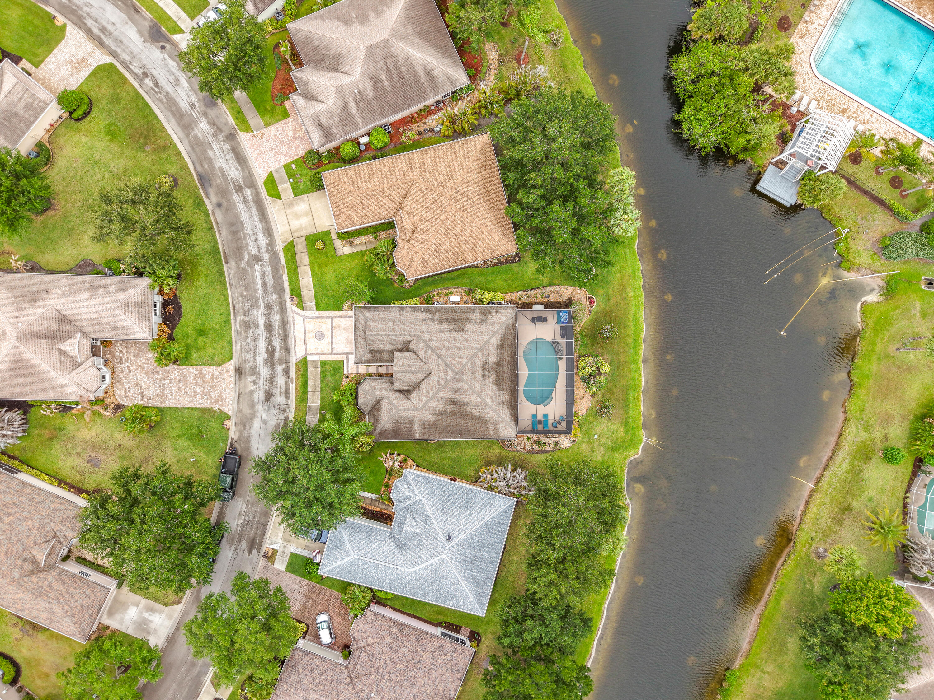 1343 Shoreline Circle Sebastian, FL 32958 - Photo 36 of 36 an aerial view of a house with a garden