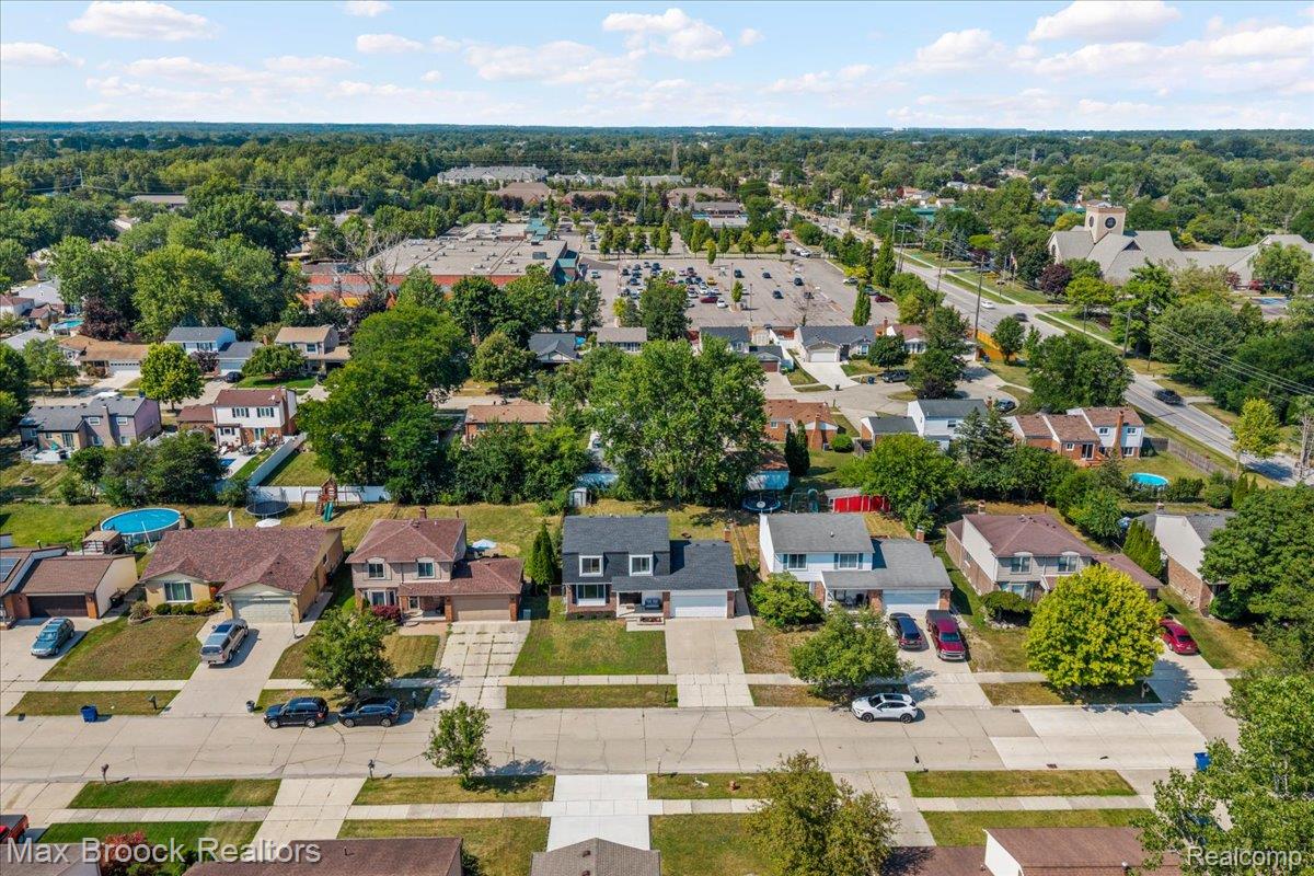 42470 Bishop Road Canton, MI 48188 - Photo 31 of 37 Residential street with established homes, mature trees, and nearby commercial areas