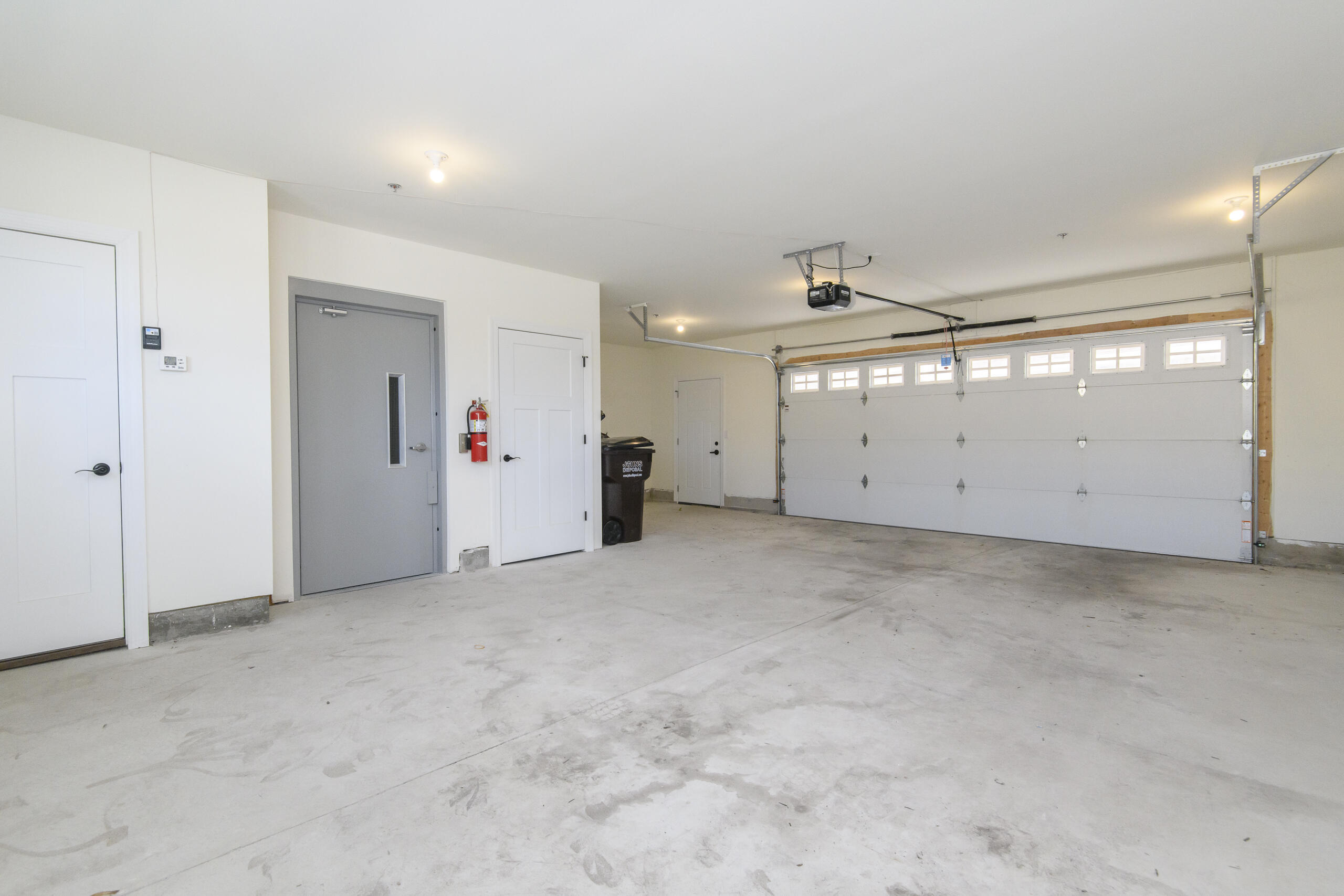 208 Grand Avenue, Unit 3 Mukwonago, WI 53149 - Photo 18 of 51 Elevator in garage