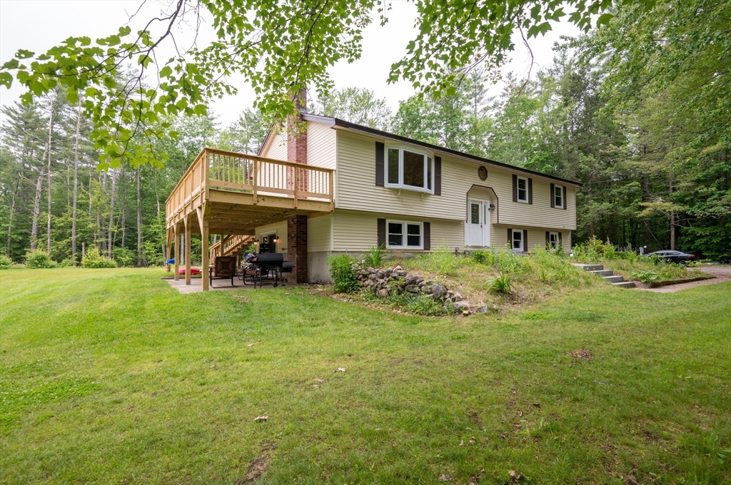 226 Raymond Road Nottingham, NH 03290 - Photo 3 of 42 a view of a house with backyard