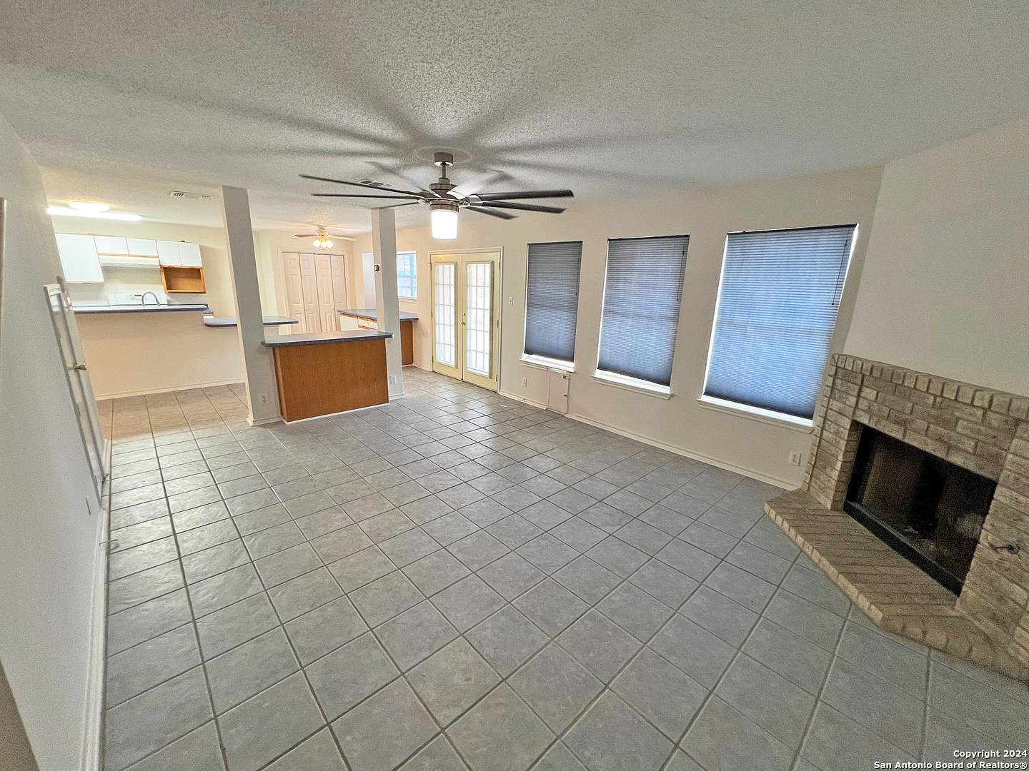 7514 Autumn Ledge Converse, TX 78109 - Photo 11 of 37 a view of a livingroom with a fireplace