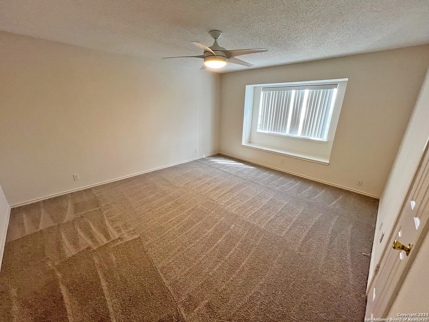 7514 Autumn Ledge Converse, TX 78109 - Photo 25 of 37 a view of an empty room with a window