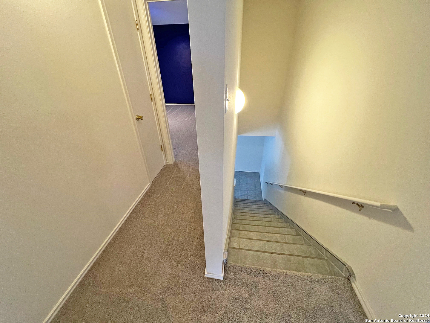 7514 Autumn Ledge Converse, TX 78109 - Photo 32 of 37 a view of a hallway with wooden floor