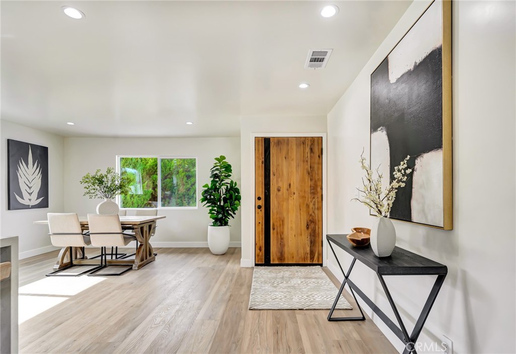 6512 Franrivers Avenue West Hills, CA 91307 - Photo 11 of 33 a living room with furniture and a wooden floor