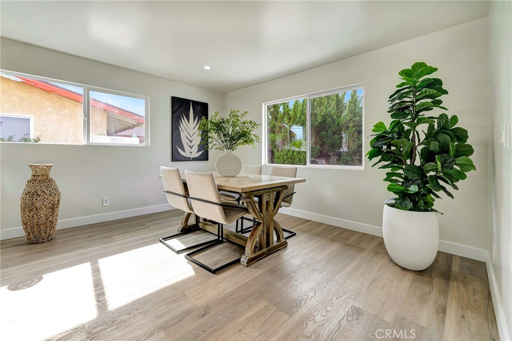 6512 Franrivers Avenue West Hills, CA 91307 - Photo 12 of 33 a living room with furniture and a potted plant