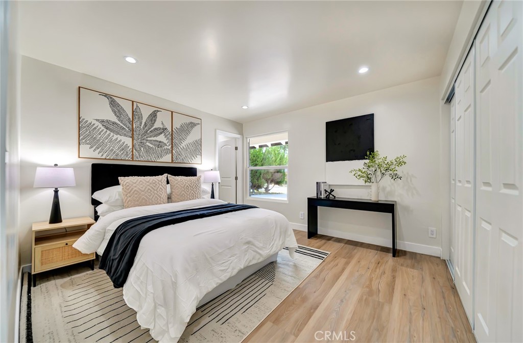 6512 Franrivers Avenue West Hills, CA 91307 - Photo 19 of 33 a bedroom with a bed and a flat screen tv