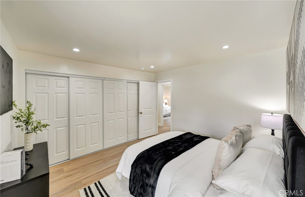 6512 Franrivers Avenue West Hills, CA 91307 - Photo 20 of 33 a bedroom with a bed and a potted plant