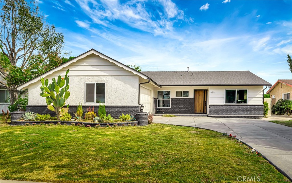 6512 Franrivers Avenue West Hills, CA 91307 - Photo 30 of 33 a front view of house with yard