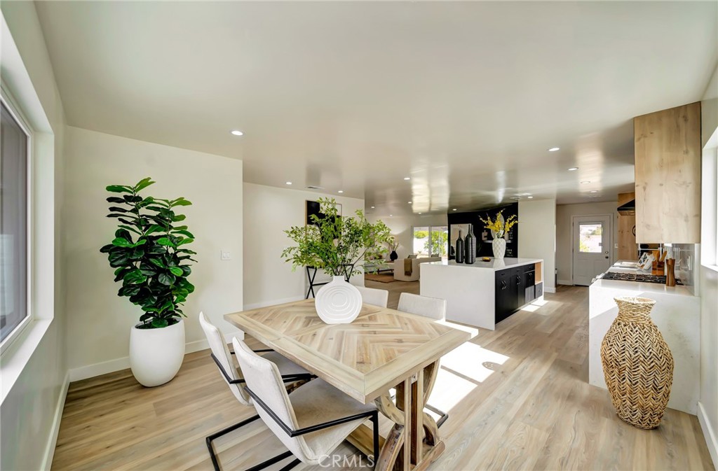 6512 Franrivers Avenue West Hills, CA 91307 - Photo 10 of 33 a dining room with furniture and wooden floor