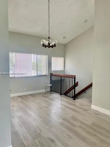 a view of a room with a window