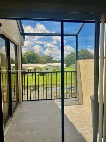 a view of a large window with a balcony