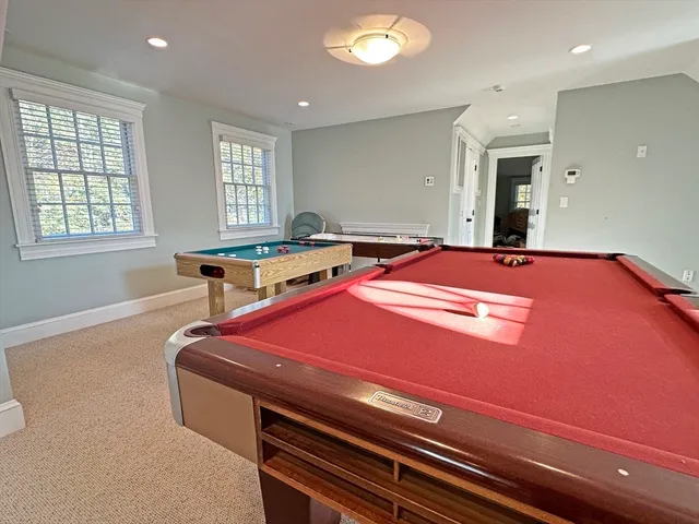 a backyard with stainless steel appliances sinks stove and cabinets