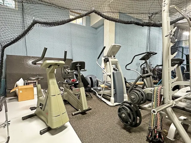 a view of a room with gym equipment