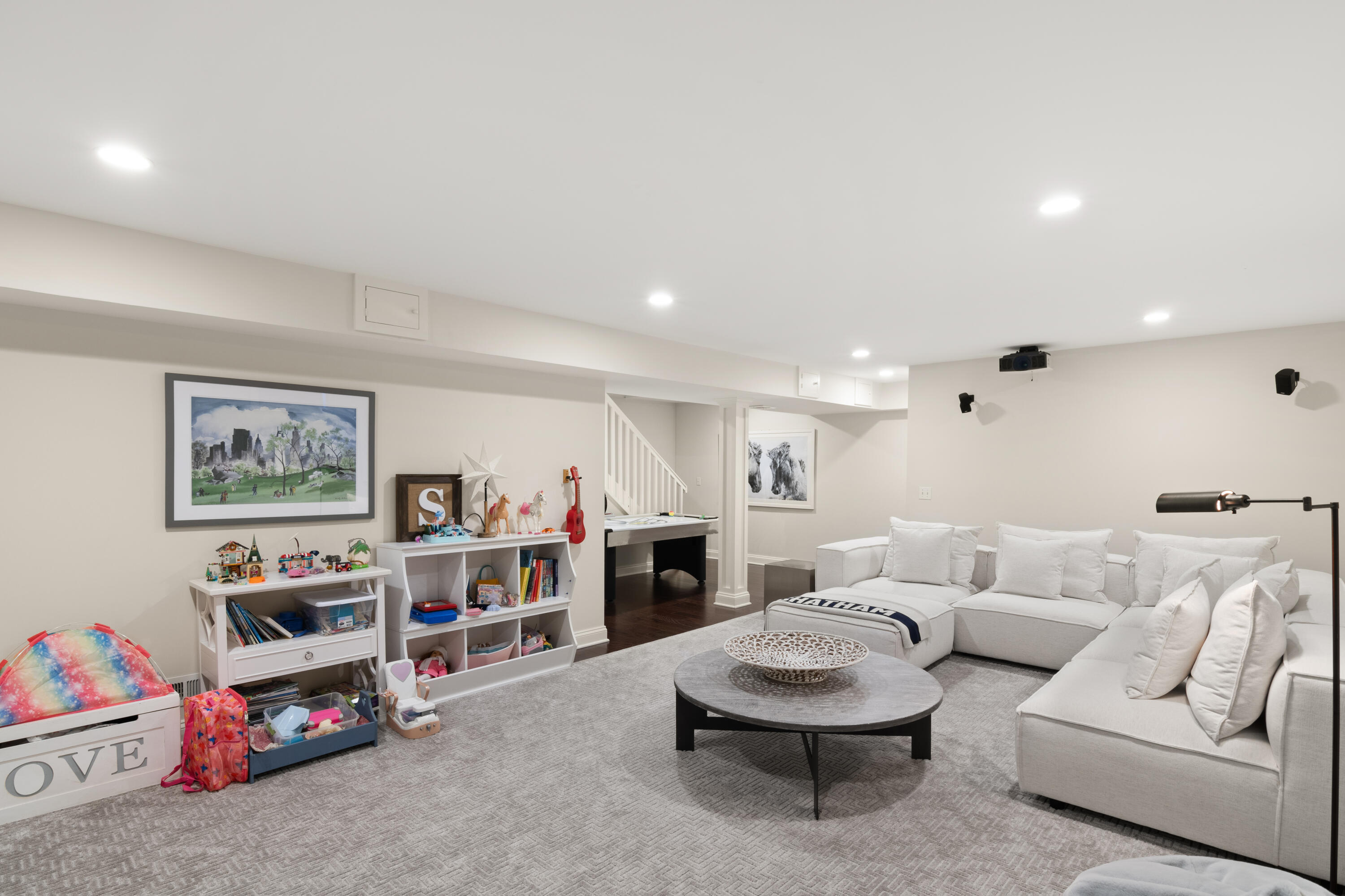 12 1/2 Ridgewood Road Rowayton, CT 06853 - Photo 25 of 25 a living room with furniture and a bookshelf