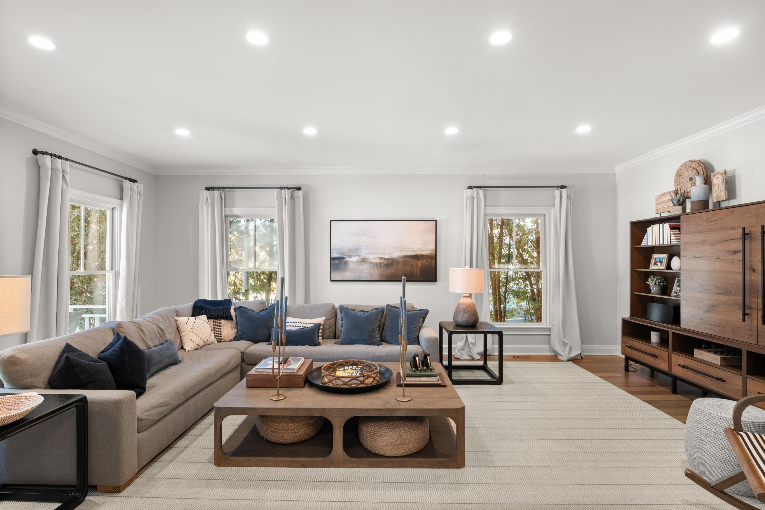 12 1/2 Ridgewood Road Rowayton, CT 06853 - Photo 3 of 25 a living room with furniture a flat screen tv and a large window