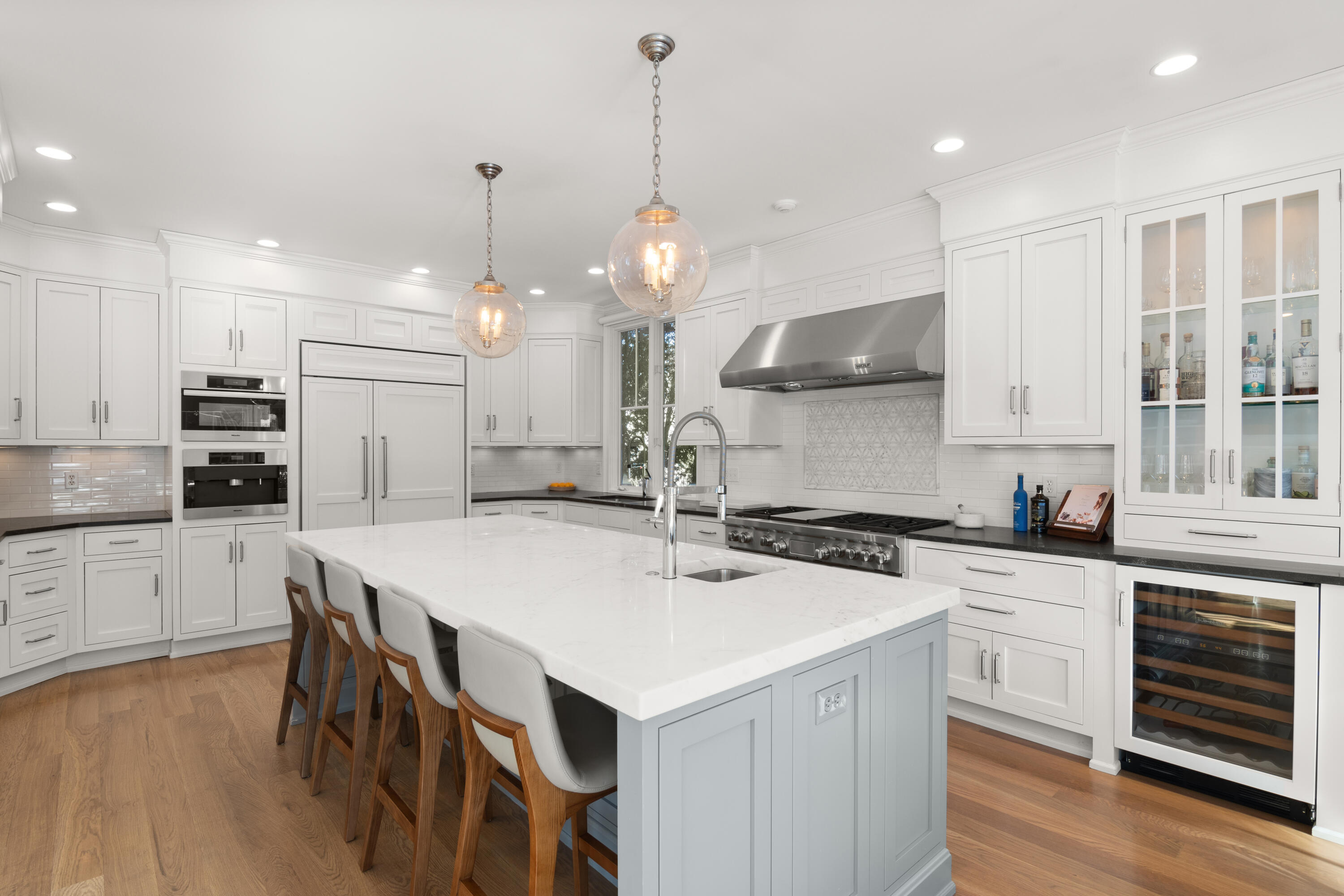 12 1/2 Ridgewood Road Rowayton, CT 06853 - Photo 6 of 25 a kitchen that has a lot of cabinets in it wooden floor and a sink